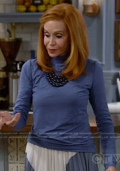 Sheila's blue colorblock pleated skirt on Call Me Kat