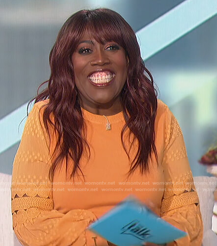 Sheryl's orange embroidered top on The Talk