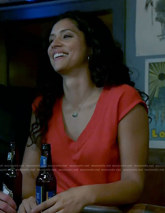 Stella's red v-neck top on Chicago Fire