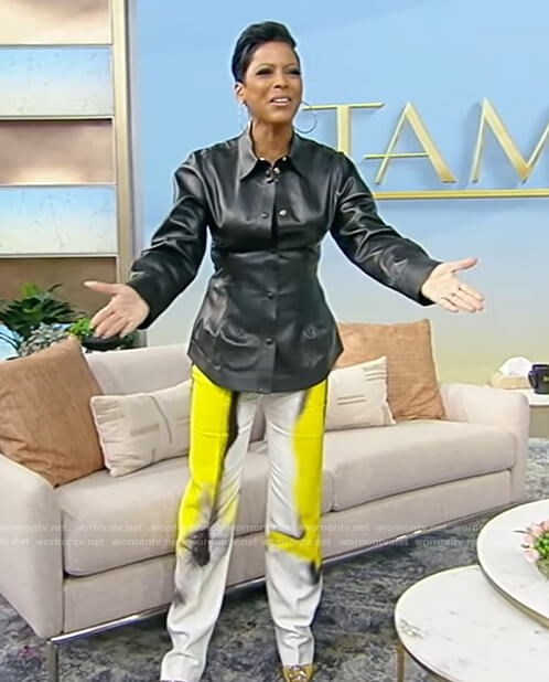 Tamron's leather shirt and metallic pants on Tamron Hall Show