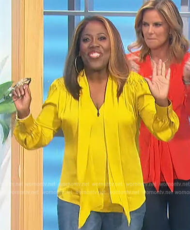 Sheryl's yellow tie neck blouse on The Talk
