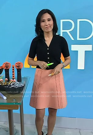 Vicky's black cardigan with star buttons on Today