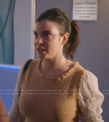 Alexis's orange knit layered blouse on 9-1-1