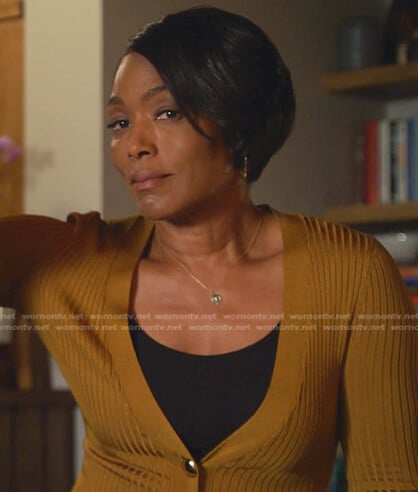 Athena's mustard ribbed cardigan on 9-1-1