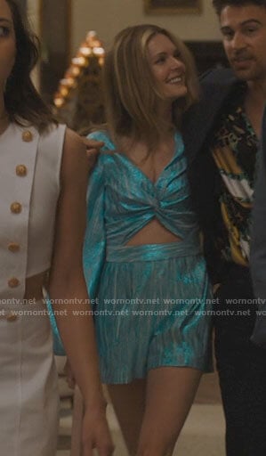 Daphne's metallic blue cutout romper on The White Lotus