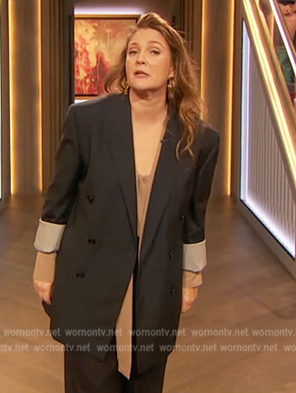 Drew's pinstripe blazer and tie neck blouse on The Drew Barrymore Show