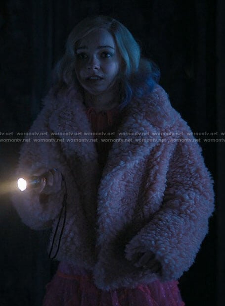 Enid's pink fur jacket on Wednesday