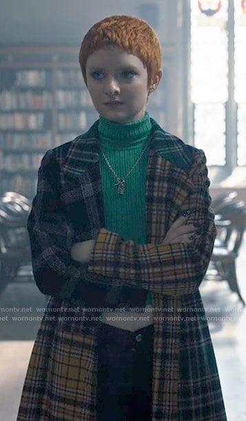 Glenda's plaid coat and green turtleneck on Chucky
