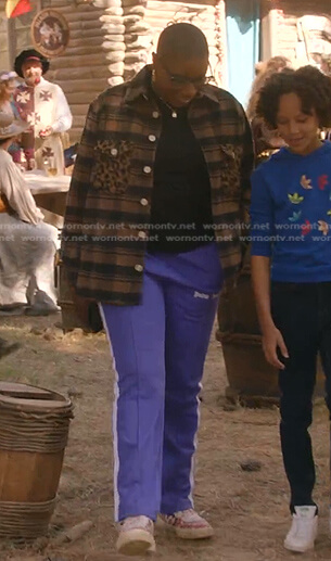 Hen's brown plaid shirt and purple pants on 9-1-1