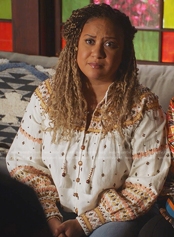 Karen's white embroidered blouse on 9-1-1