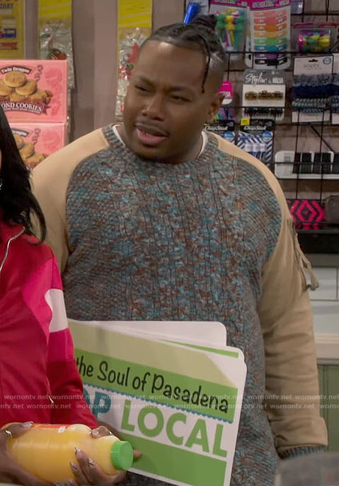 Marty's cable knit sweater with contrasting sleeves on The Neighborhood
