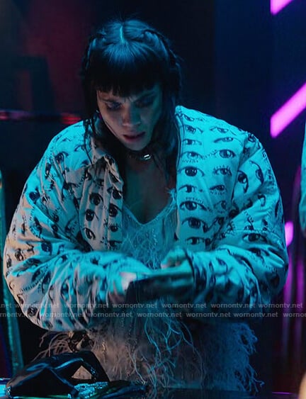 Mencia's white eye print jacket on Elite