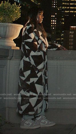Misty's long geometric coat on The Equalizer