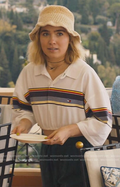 Portia's striped polo shirt and crochet hat on The White Lotus