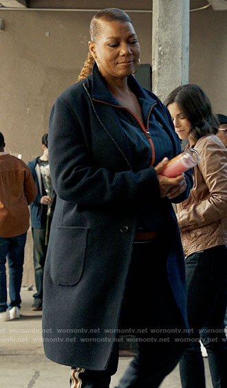 Robyn's navy coat and pinstripe jacket and pants set on The Equalizer