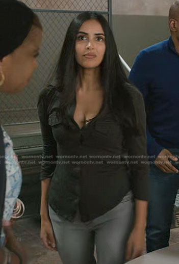 Saanvi's black button down top on Manifest
