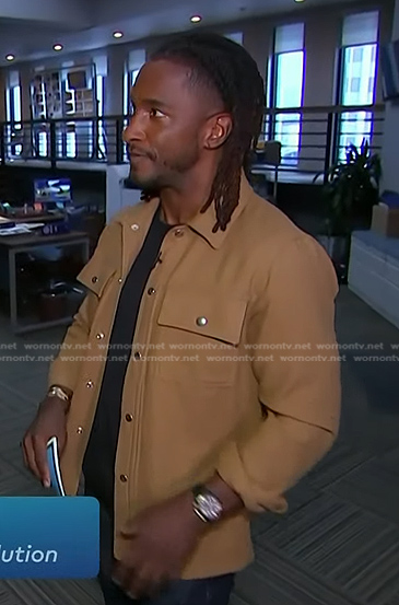 Scott's beige button jacket on Access Hollywood
