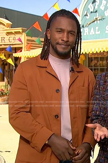 Scott's orange jacket on Access Hollywood