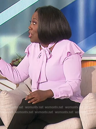 Sheryl's pink tie neck blouse on The Talk