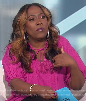 Sheryl's pink tassel tie top on The Talk