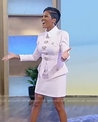 Tamron's pink embellished button mini dress on Tamron Hall Show