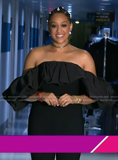 Tia Mowry's black ruffled off-shoulder jumpsuit on Today