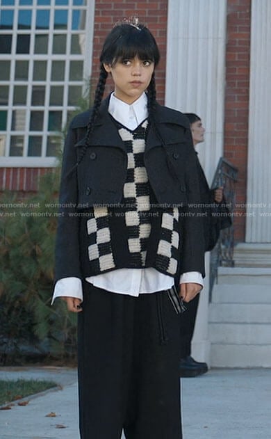 Wednesday's checkerboard knit vest and croppped jacket on Wednesday