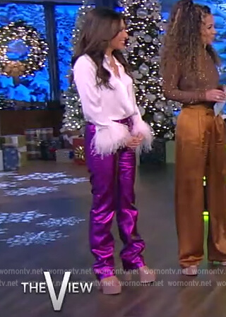 Alyssa's feather cuff blouse and purple metallic jeans on The View