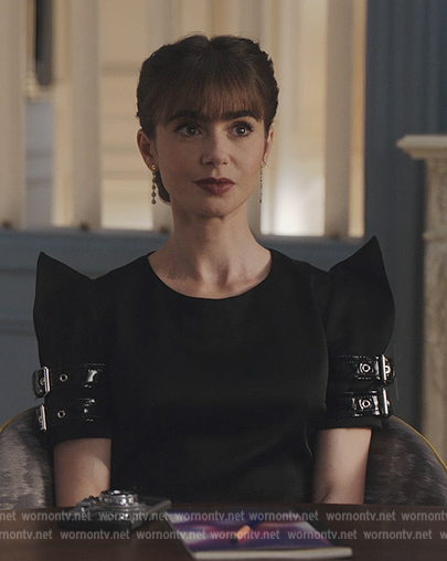 Emily's black buckle sleeve mini dress on Emily in Paris