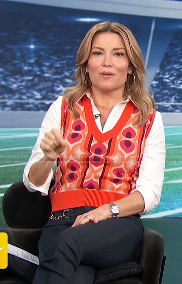 kit's orange print vest and jeans on Access Hollywood