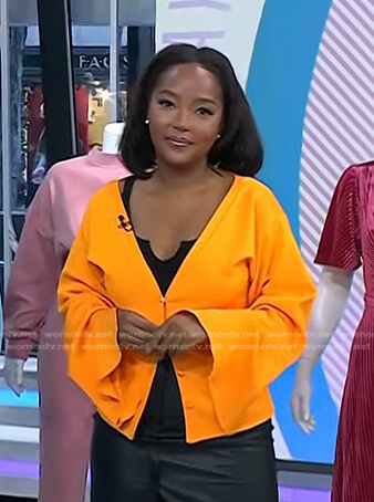 Makho's orange v-neck cardigan on Today