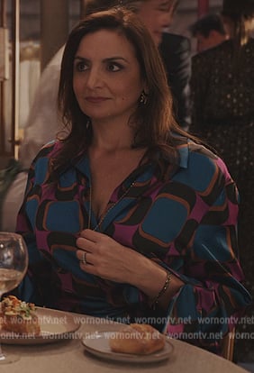Marianne's blue geometric print dress on Emily in Paris