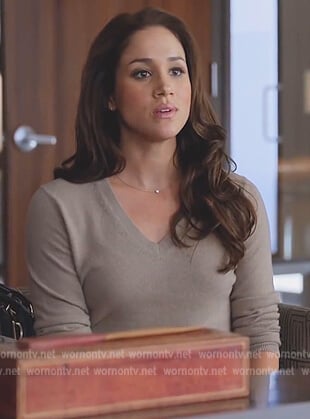 Meghan Markle's beige v-neck sweater on Harry and Meghan