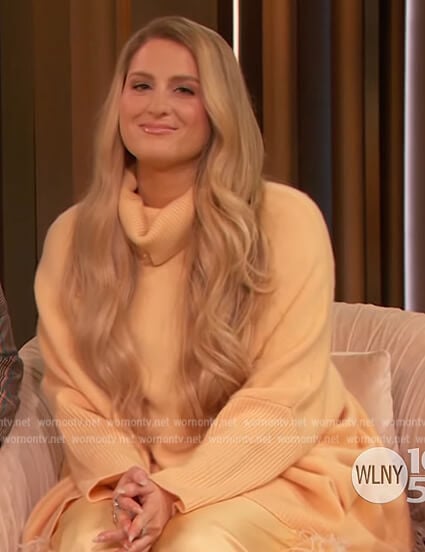 Meghan Trainor's orange turtleneck sweater on The Drew Barrymore Show