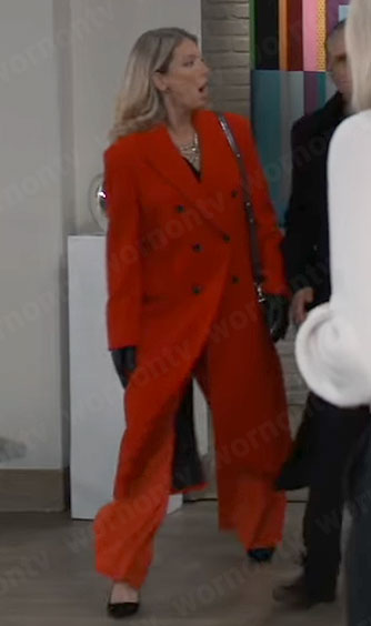 Nina's long orange-red coat on General Hospital