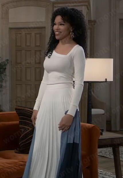 Portia's white asymmetric sweater and colorblock pleated skirt on General Hospital