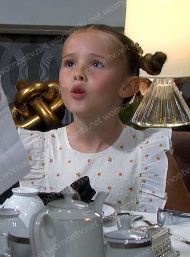 Rachel’s white orange print dress on Days of our Lives