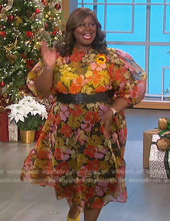 Retta's floral tie neck dress on The Talk