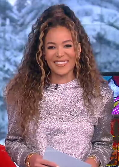 Sunny's silver metallic sweater and skirt on The View