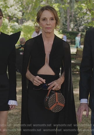 Sylvie's black cape blouse on Emily in Paris