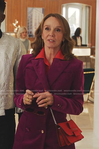 Sylvie's fuchsia velvet blazer and pants on Emily in Paris
