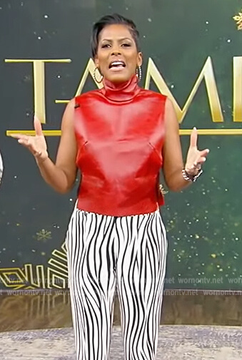 Tamron's red leather top and zebra stripe pants on Tamron Hall Show