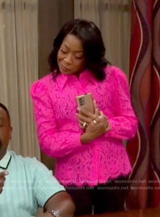 Tina's pink lace shirt on The Neighborhood