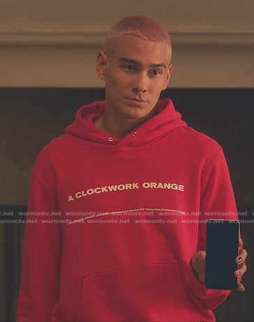 Aki's red hoodie and print jeans on Gossip Girl