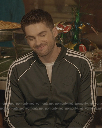 Asher's black sleeve stripe track jacket on All American