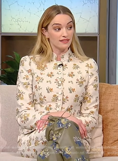 Brianne Howey's white floral blouse and pants on Tamron Hall Show