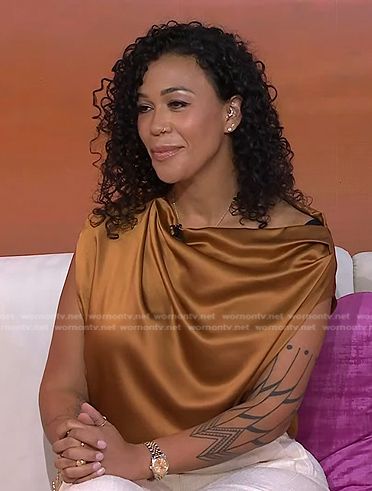 Devi Brown's orange satin top on Today