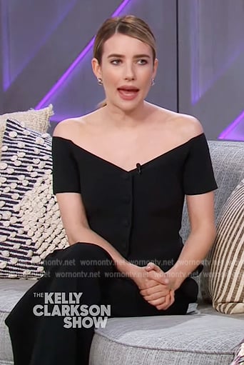 Emma Roberts's black off shoulder top and boots on The Kelly Clarkson Show