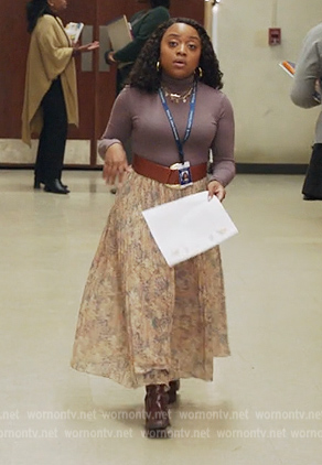 Janine's floral pleated skirt on Abbott Elementary