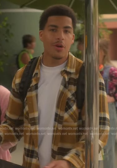 Junior's mustard plaid shirt on Grown-ish